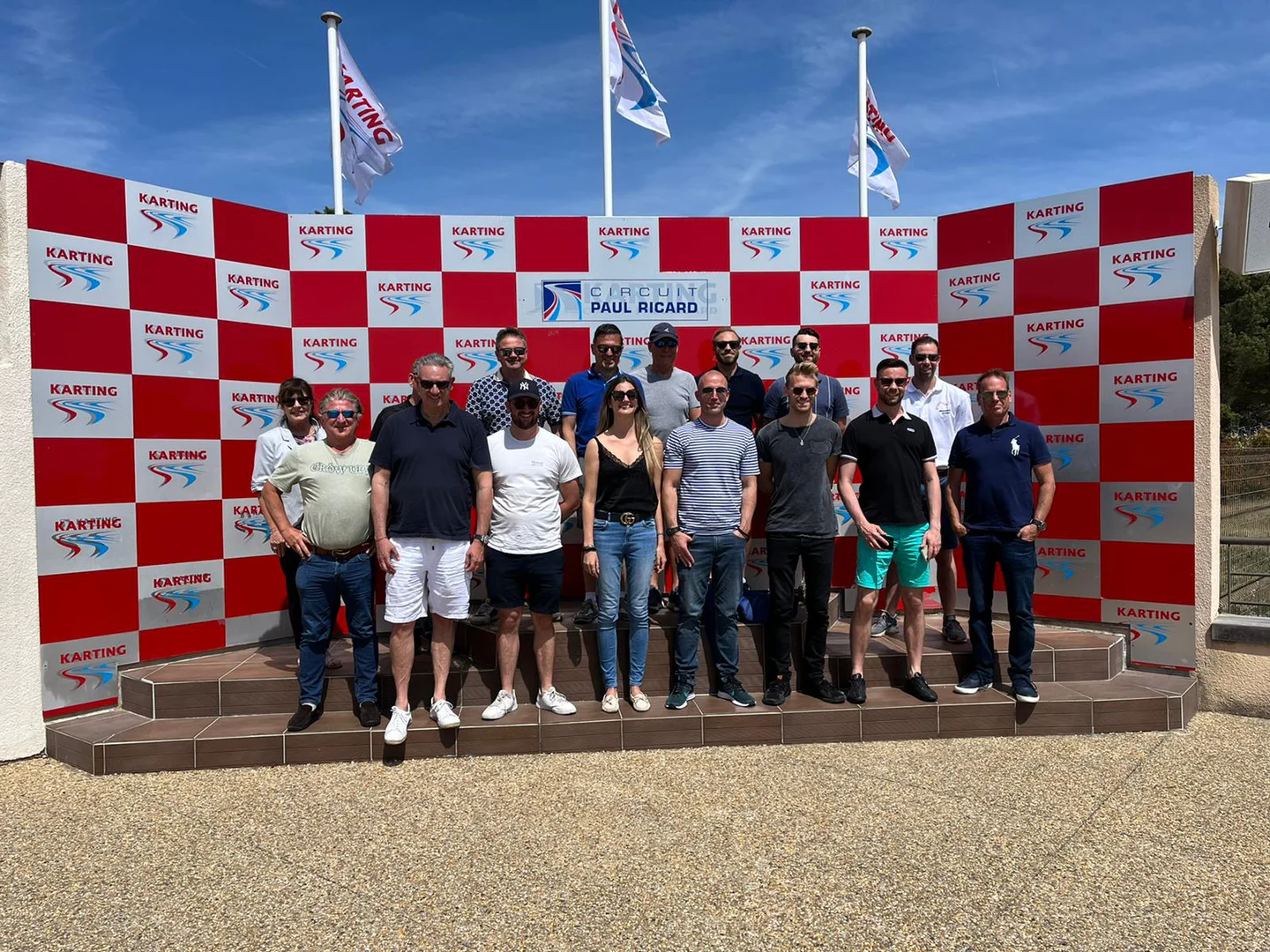 Corporate group photograph at a motorsport event