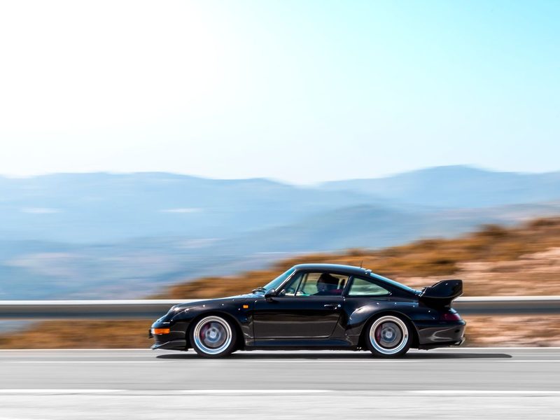 Supercar on a winding mountain road